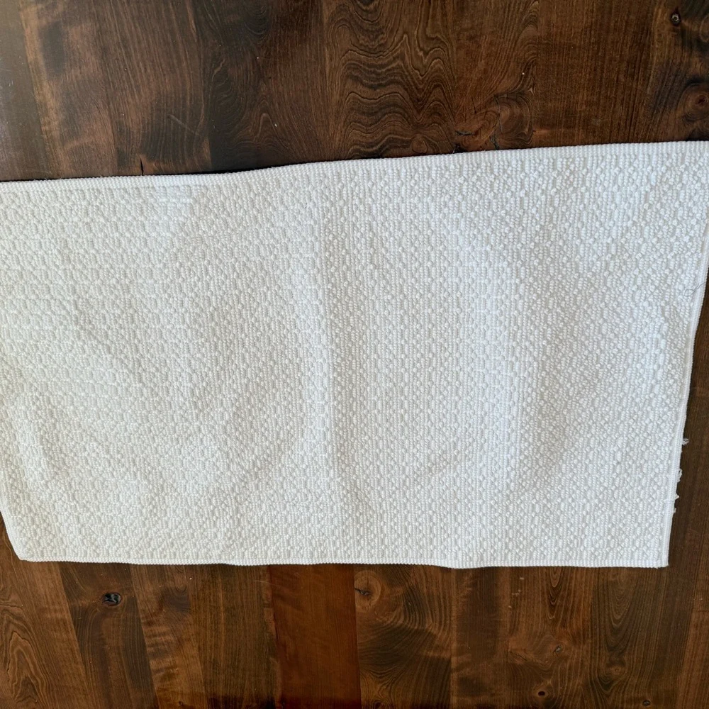 Bright white rug 34 by 20 does have some light fray  on edges.
